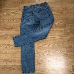 Levi's Classic Blue Jeans straight leg/ 26 by 28, red tab 501 skinny, like new